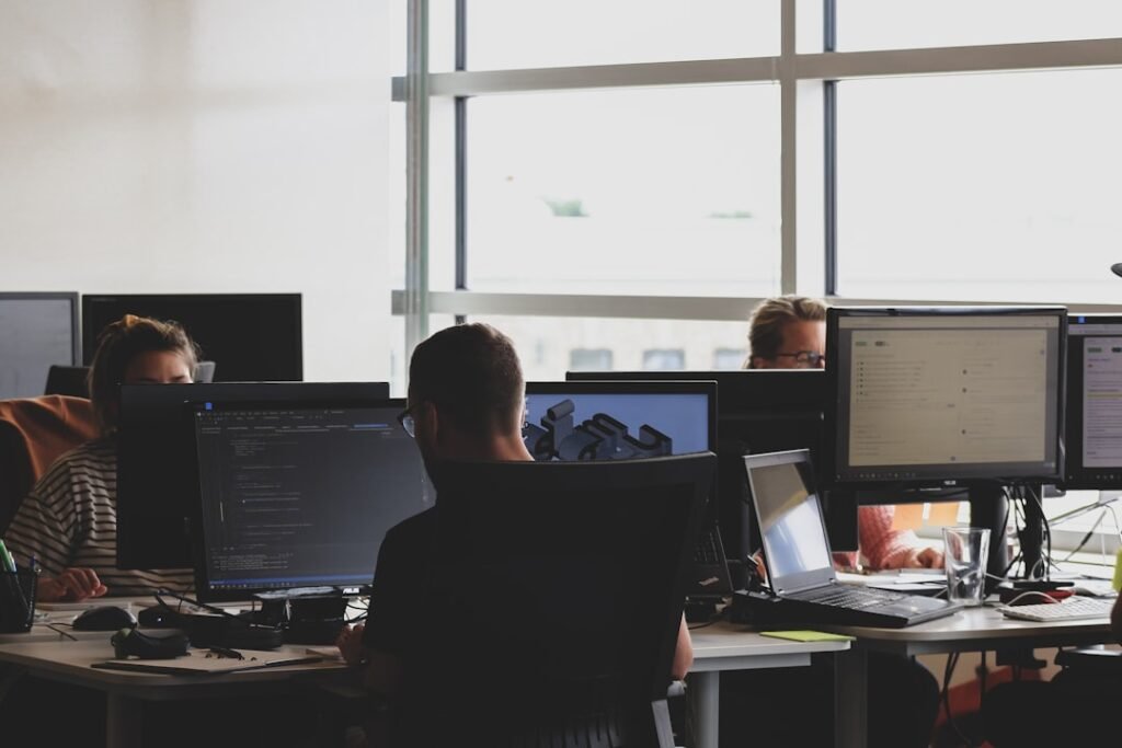 Colleagues reviewing a data architecture on screen together